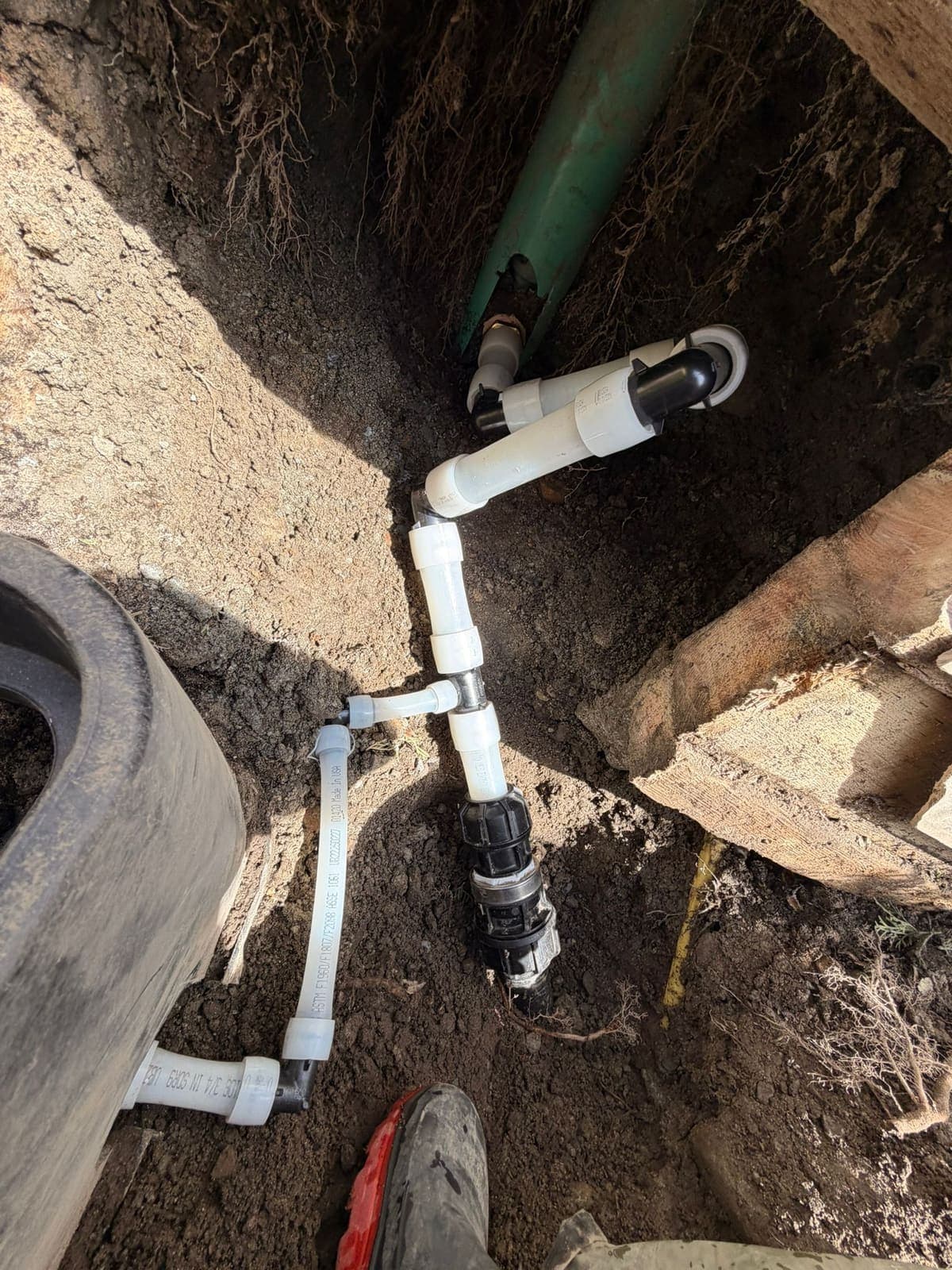 Underground sewer-line PVC repair on a Mr. Plunger trenchless dig